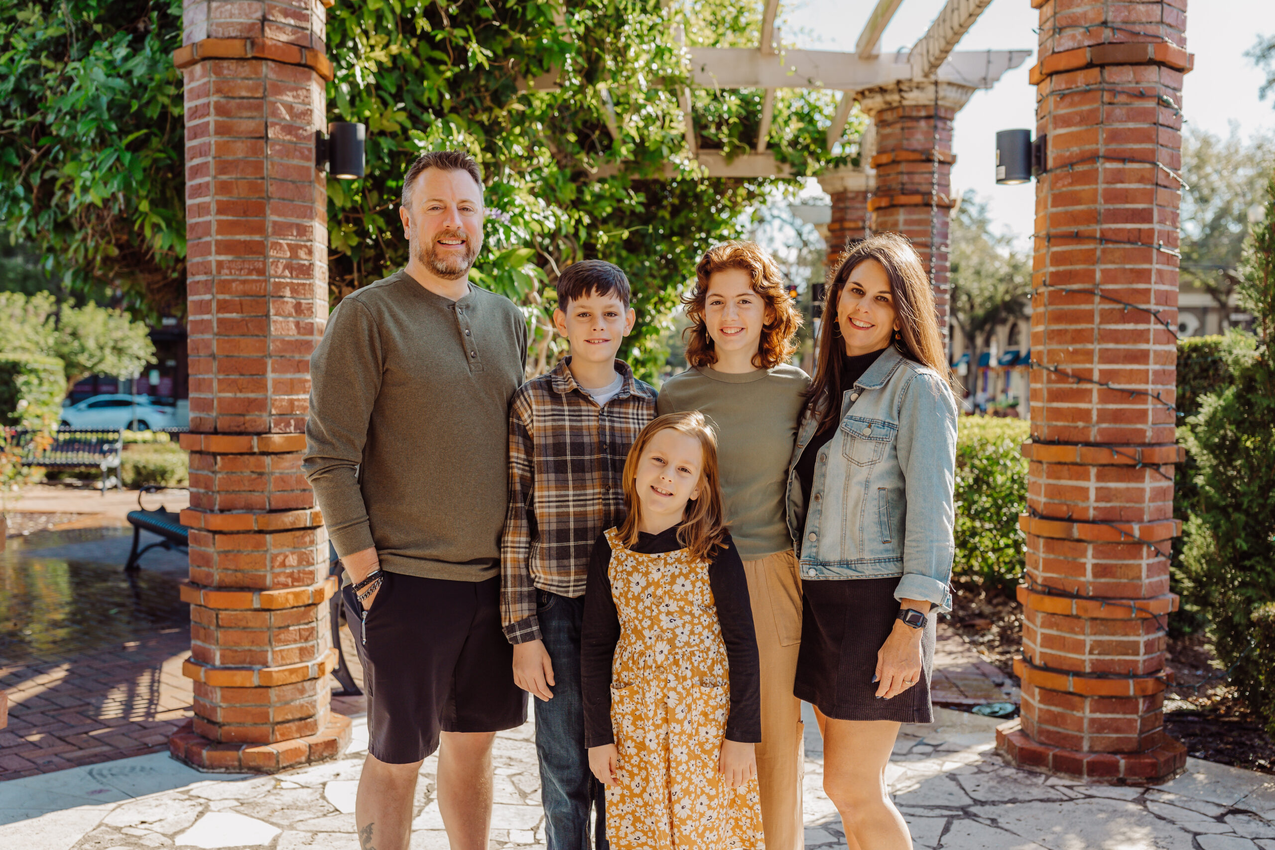 Jessica Remillard's Family Smiling in Park Avenue Jessica Remillard's Family of 5 in Park Avenue, Winter Park, Florida