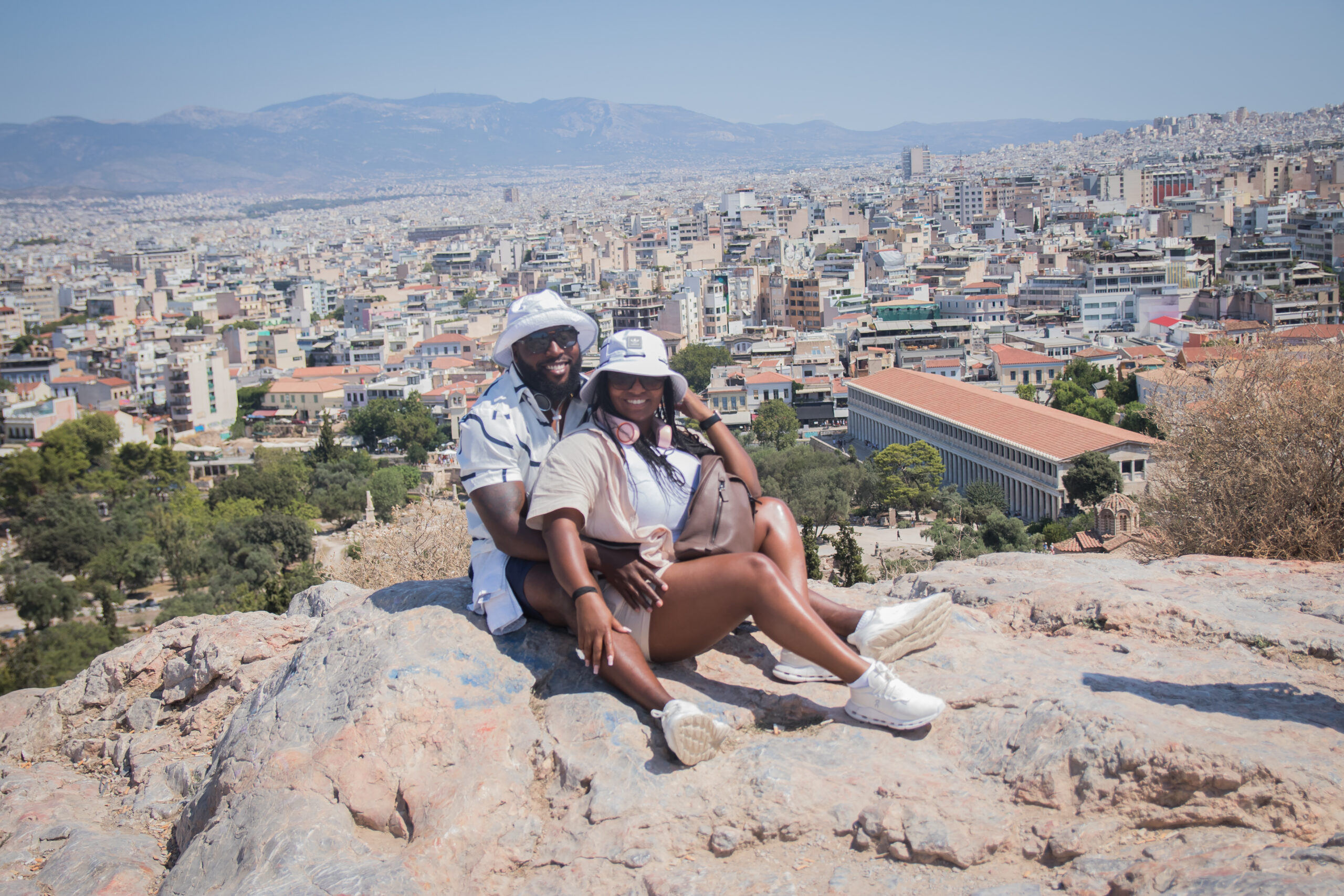Jasmine and Raheem Kelly-Reid Traveling in Athens Greece  Jasmine and Raheem Kelly-Reid Traveling in Athens Greece in matching White Outfit
